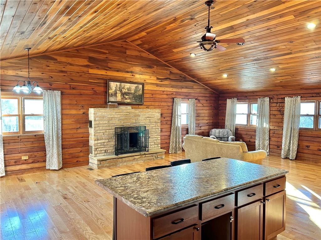 110 Horseshoe Bend Road Prosperity, PA 15329 - Photo 5 of 16 an open kitchen with granite countertop a stove and a wooden floors