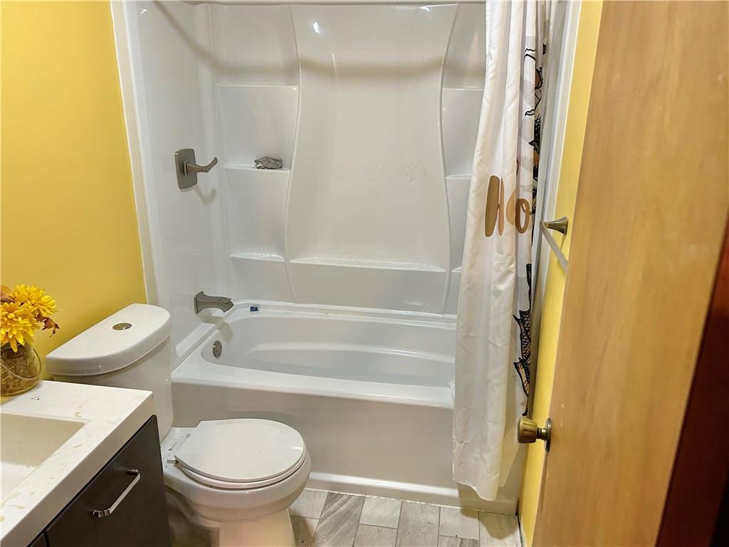 110 Horseshoe Bend Road Prosperity, PA 15329 - Photo 10 of 16 a bathroom with a sink toilet and shower