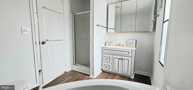 a en suite bathroom with a sink toilet and shower