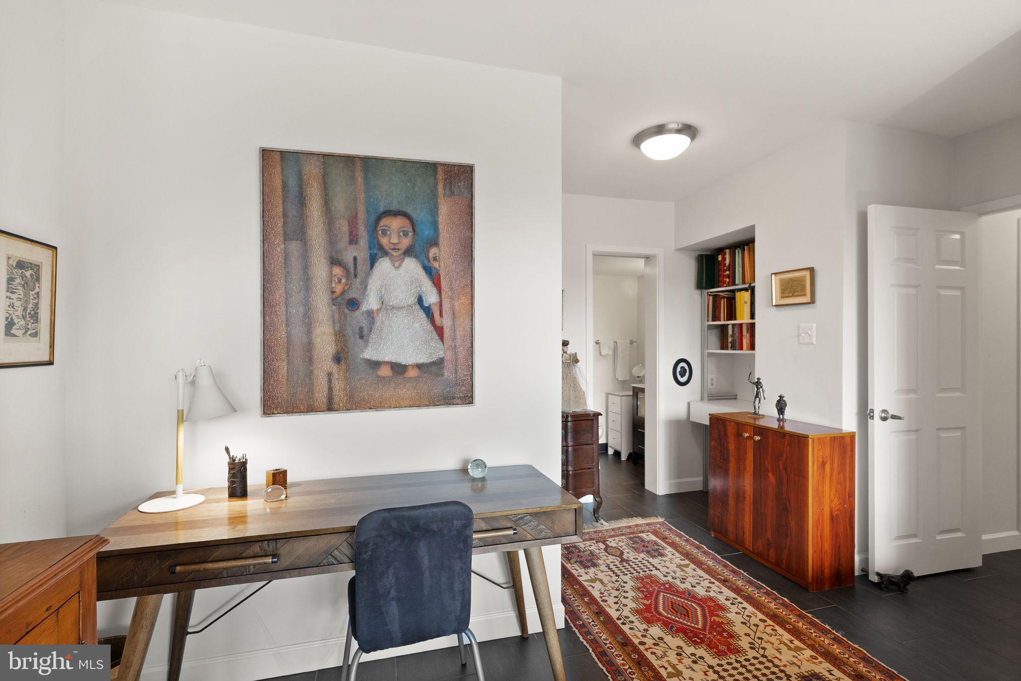 400 Madison Street, Unit 409 Alexandria, VA 22314 - Photo 26 of 98 a workspace with furniture and window