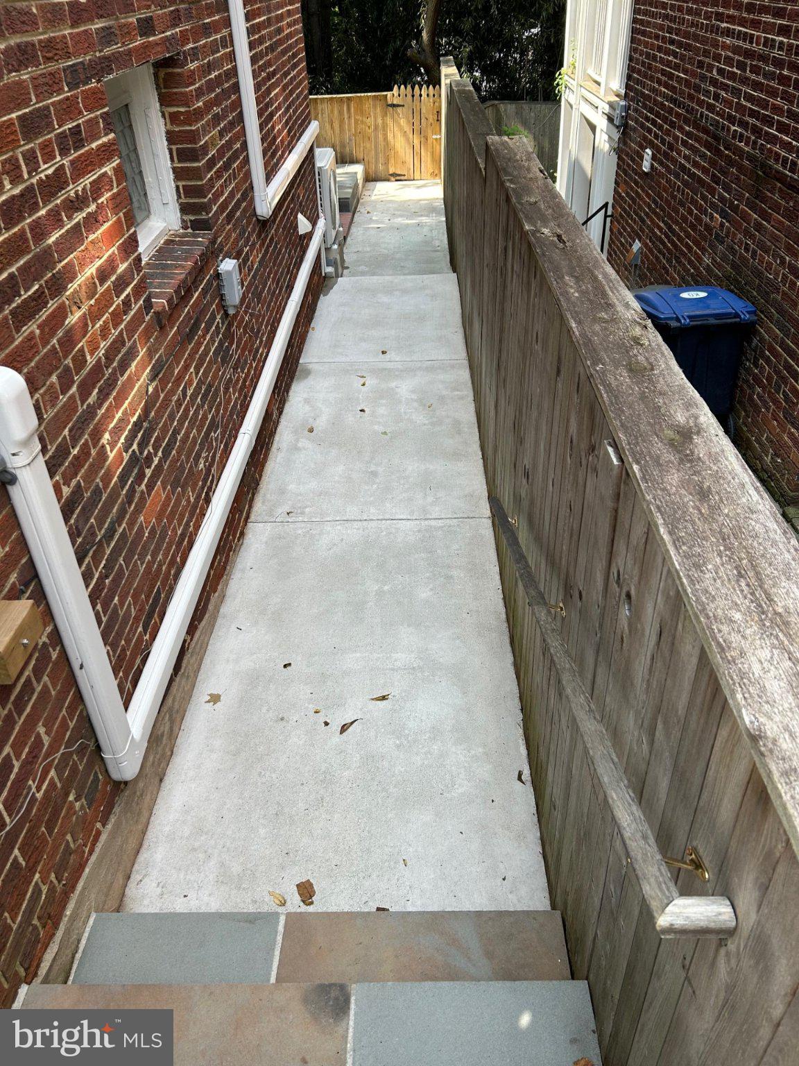 2036 Tunlaw Road Northwest Washington, DC 20007 - Photo 17 of 19 Side Fenced Walkway