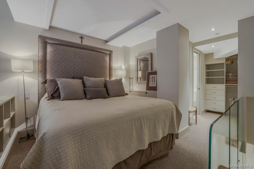 155 West 15th Street, Unit 1E Manhattan, NY 10011 - Photo 13 of 29 a bedroom with a bed and a walk in closet