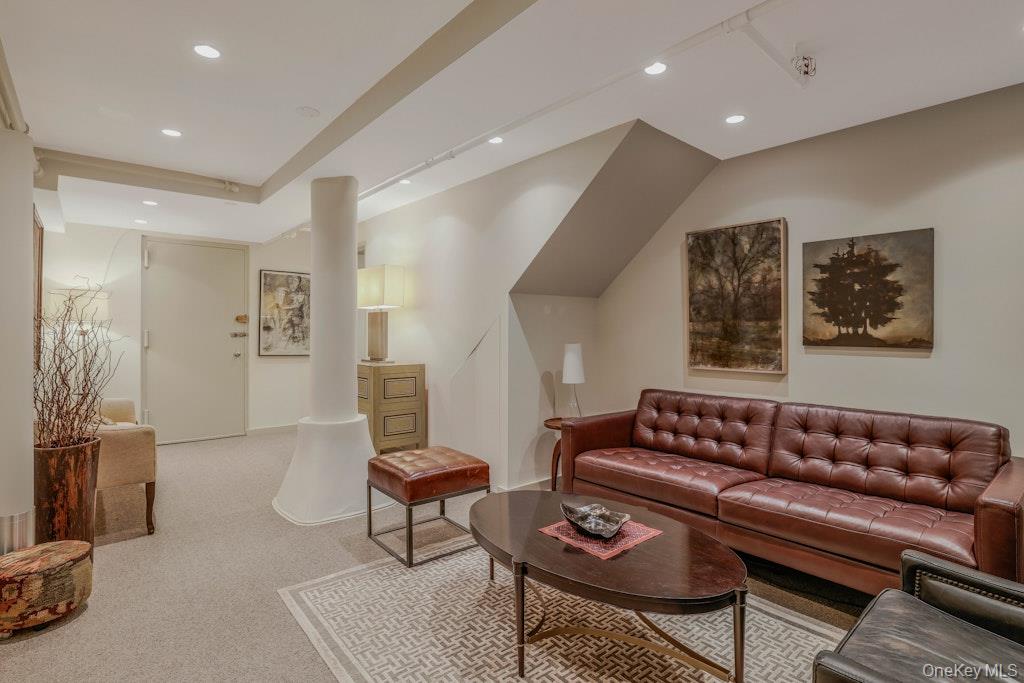 155 West 15th Street, Unit 1E Manhattan, NY 10011 - Photo 20 of 29 a living room with furniture