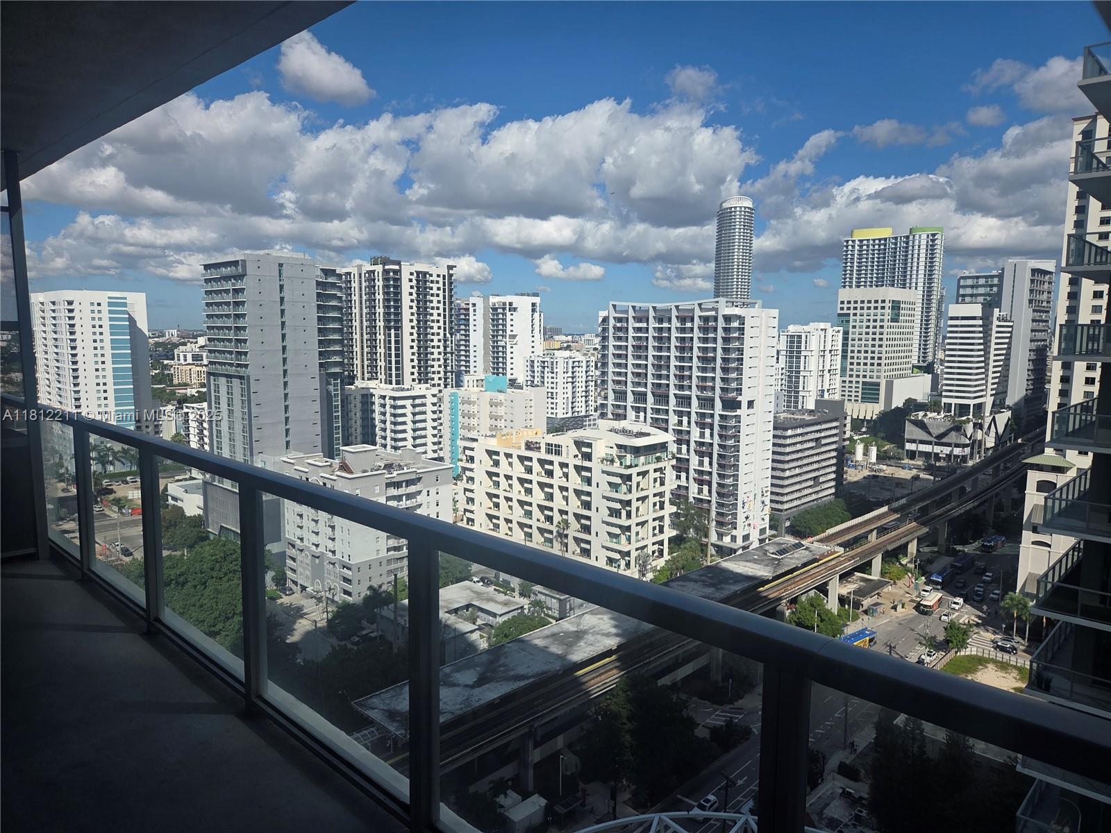 79 Southwest 12th Street, Unit 2409 Miami, FL 33130 - Photo 12 of 13 a view of balcony with city