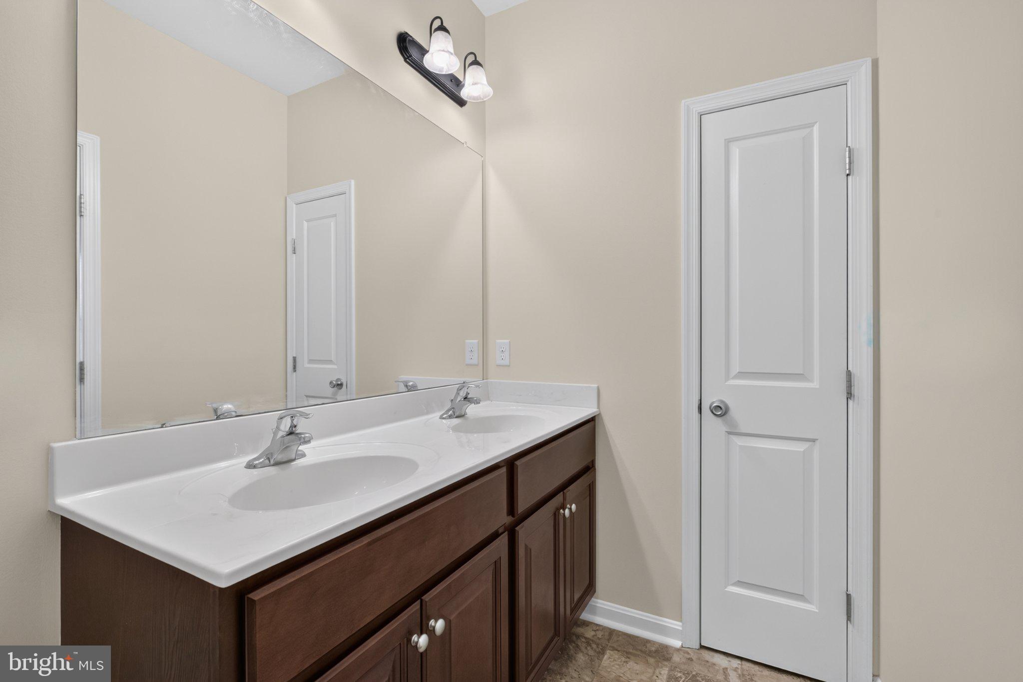 27 Sun Ridge Drive Felton, DE 19943 - Photo 39 of 61 Spacious dual-sink bathroom oasis.