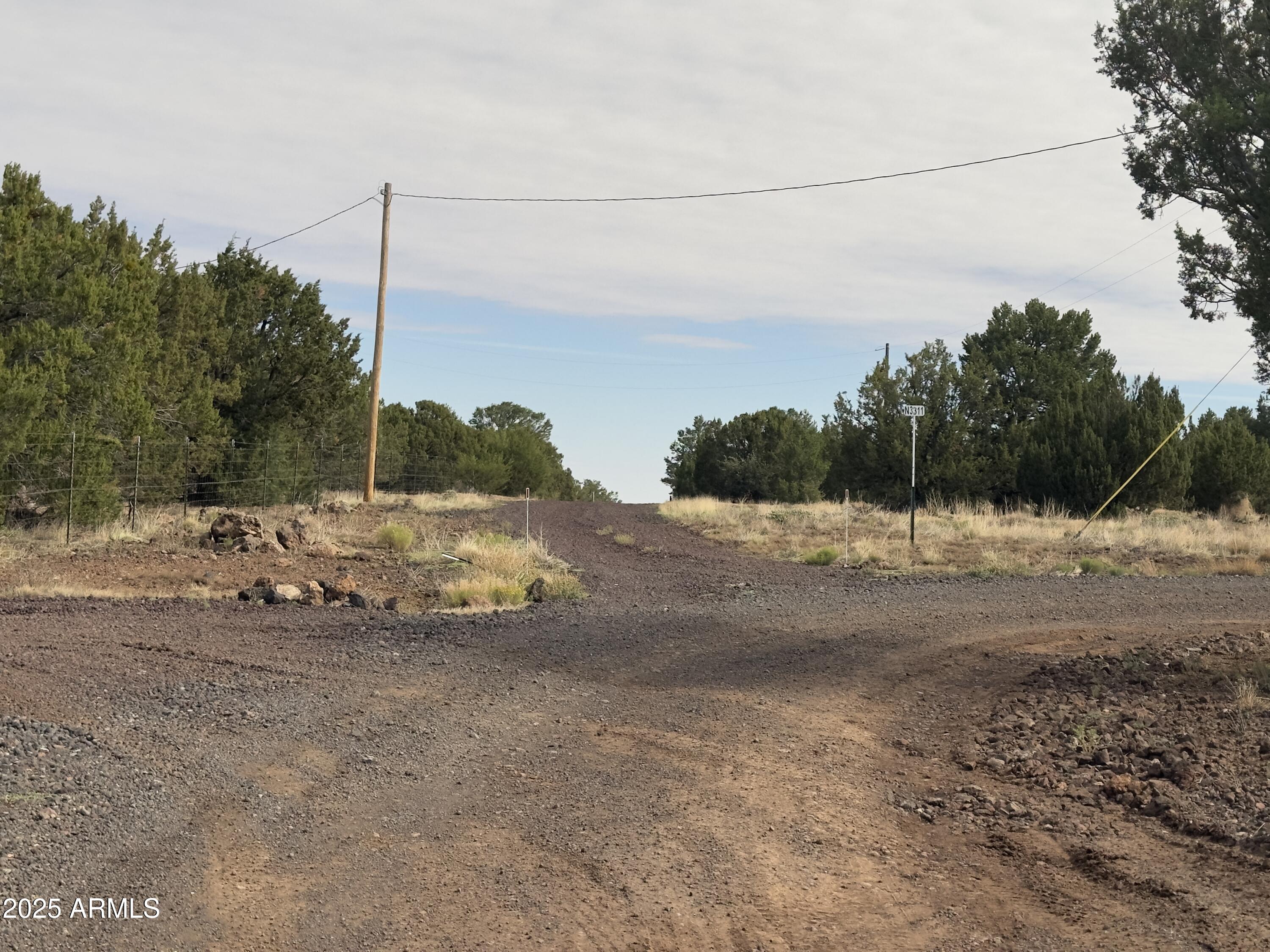 35554 State Route 260 Show Low, AZ 85901 - Photo 24 of 27 a view of a road with a snow on the road