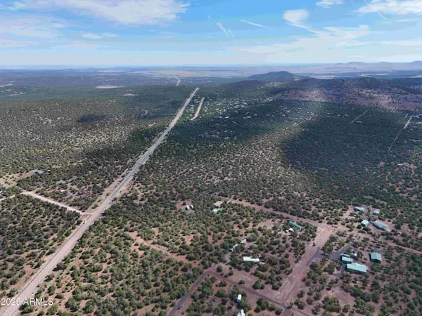 a view of a city with mountains in the background