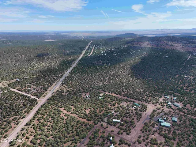 a view of a city with mountains in the background