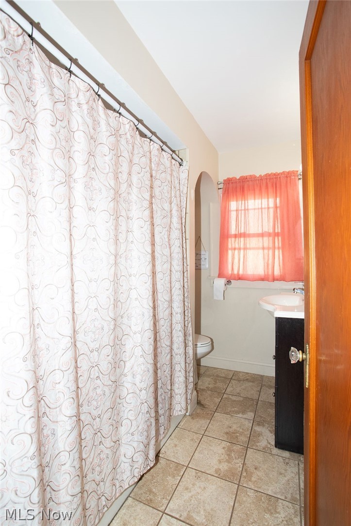 213 Como Street Struthers, OH 44471 - Photo 12 of 25 Full bathroom upstairs with ceramic tile floors