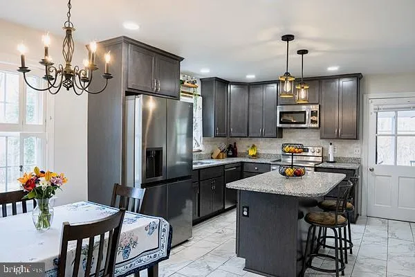 a bedroom with two beds and a window