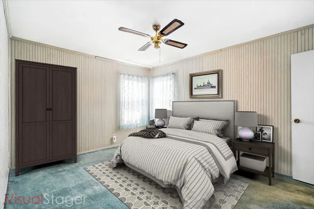 a bedroom with a bed and window