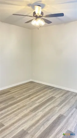 a view of a room with an empty space