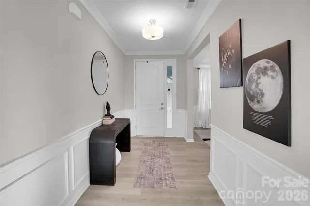 a stove top oven sitting inside of a kitchen
