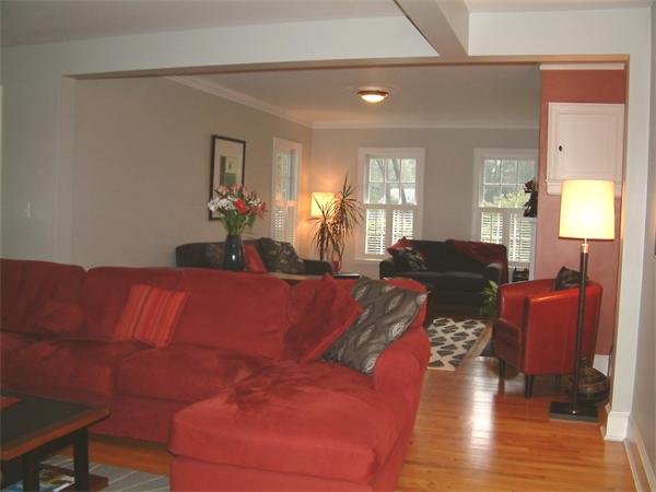 5 Berwick Road Lexington, MA 02420 - Photo 9 of 9 a living room with furniture a fireplace and a window