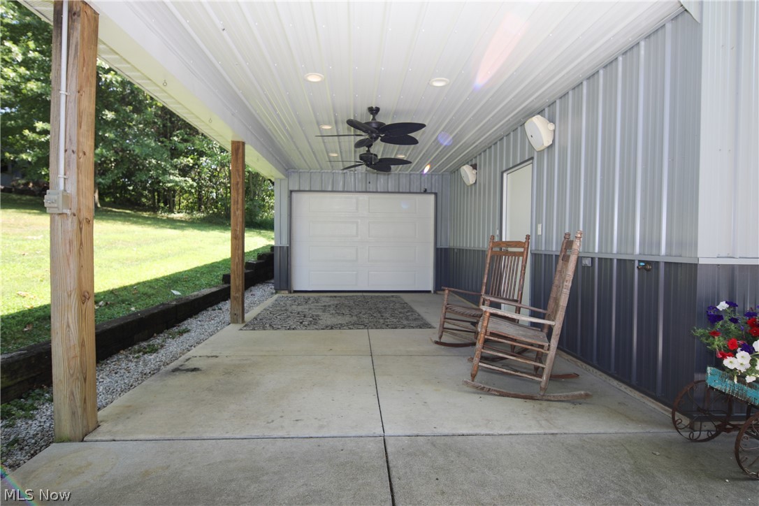 38610 Spiedel Town Road Bethesda, OH 43719 - Photo 6 of 33 Garage featuring ceiling fan and a lawn