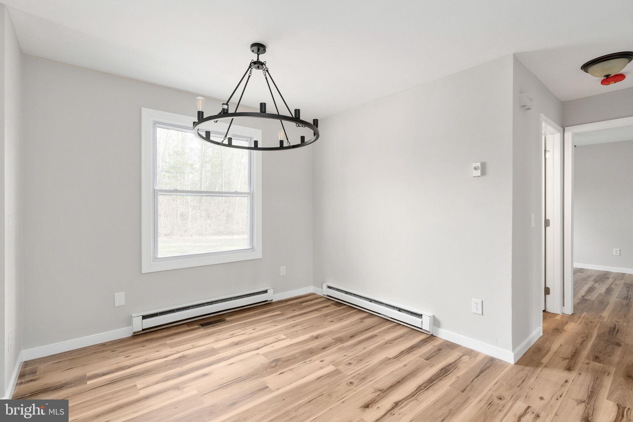 2174 Copper Line Road Bumpass, VA 23024 - Photo 14 of 45 Bright and airy space with modern charm.