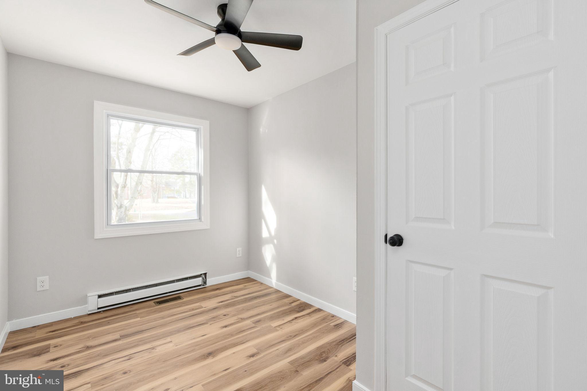 2174 Copper Line Road Bumpass, VA 23024 - Photo 26 of 45 a bedroom with a bed and a window