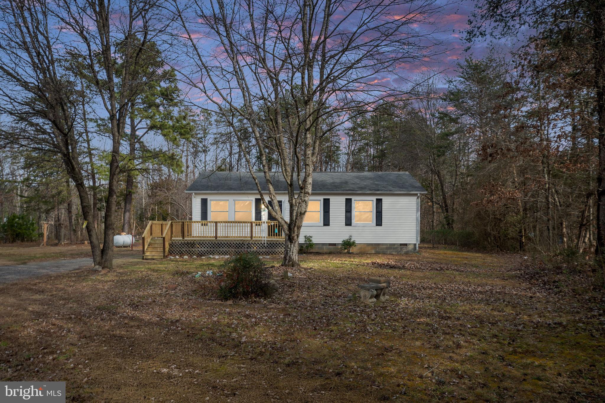 2174 Copper Line Road Bumpass, VA 23024 - Photo 3 of 45 Charming home nestled in serene woods.