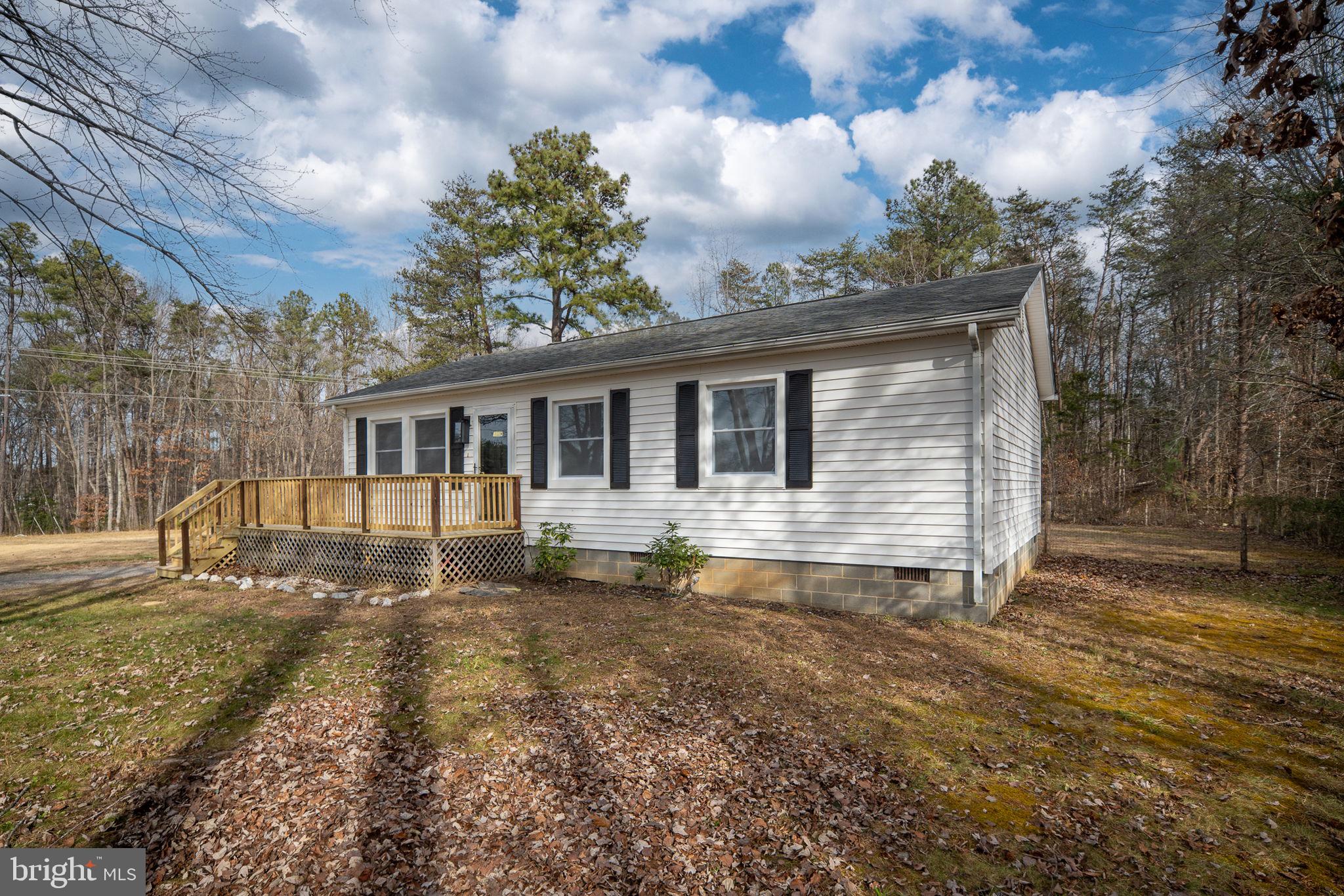 2174 Copper Line Road Bumpass, VA 23024 - Photo 33 of 45 a front view of a house with garden