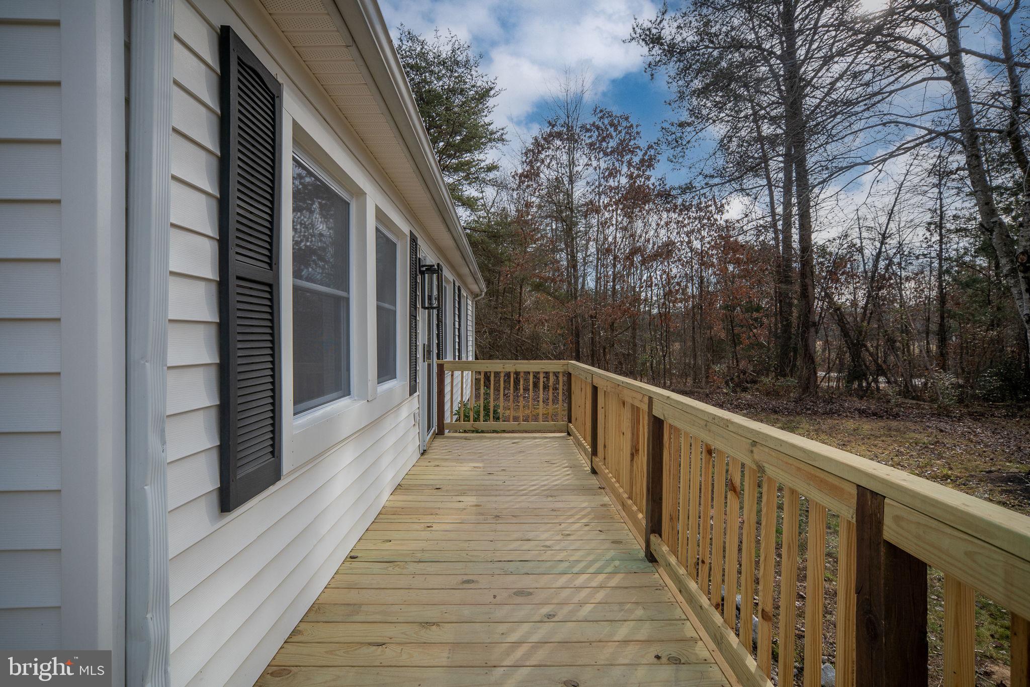 2174 Copper Line Road Bumpass, VA 23024 - Photo 36 of 45 a view of balcony and yard