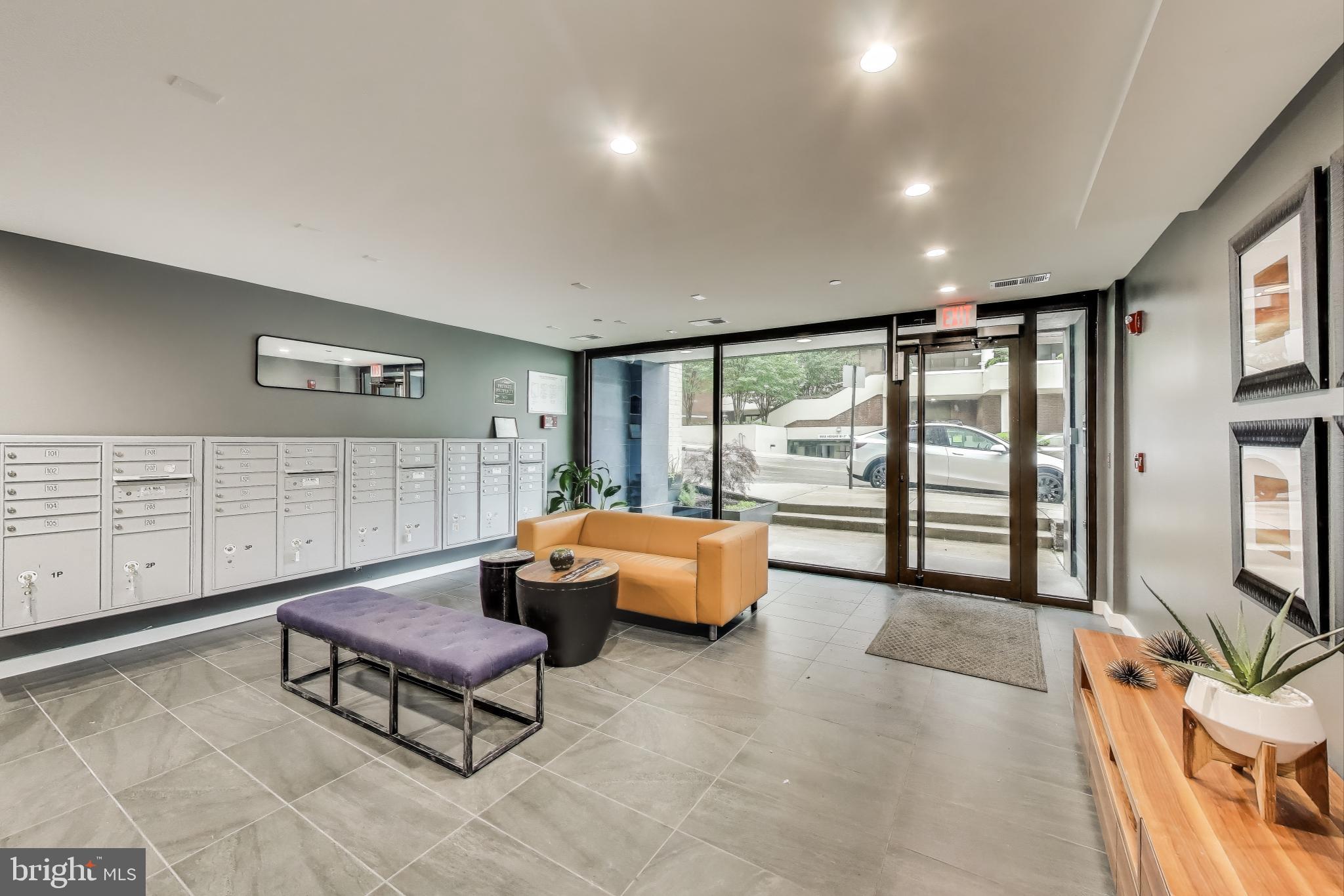 700 Roeder Road, Unit 402 Silver Spring, MD 20910 - Photo 11 of 15 Warm and welcoming lobby