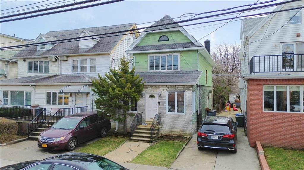 a car parked in front of a house
