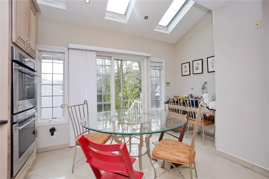 914 Avenue L Brooklyn, NY 11230 - Photo 16 of 27 a view of a dining room with furniture window and outside view