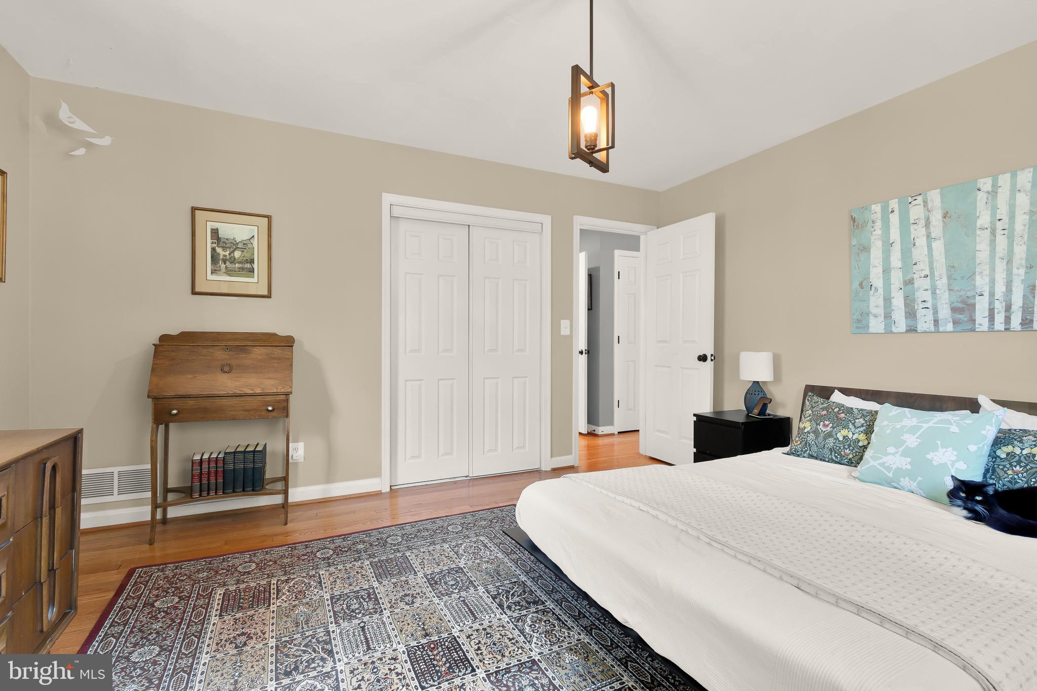 11504 Newport Mill Road Silver Spring, MD 20902 - Photo 10 of 41 a bedroom with a bed and a television