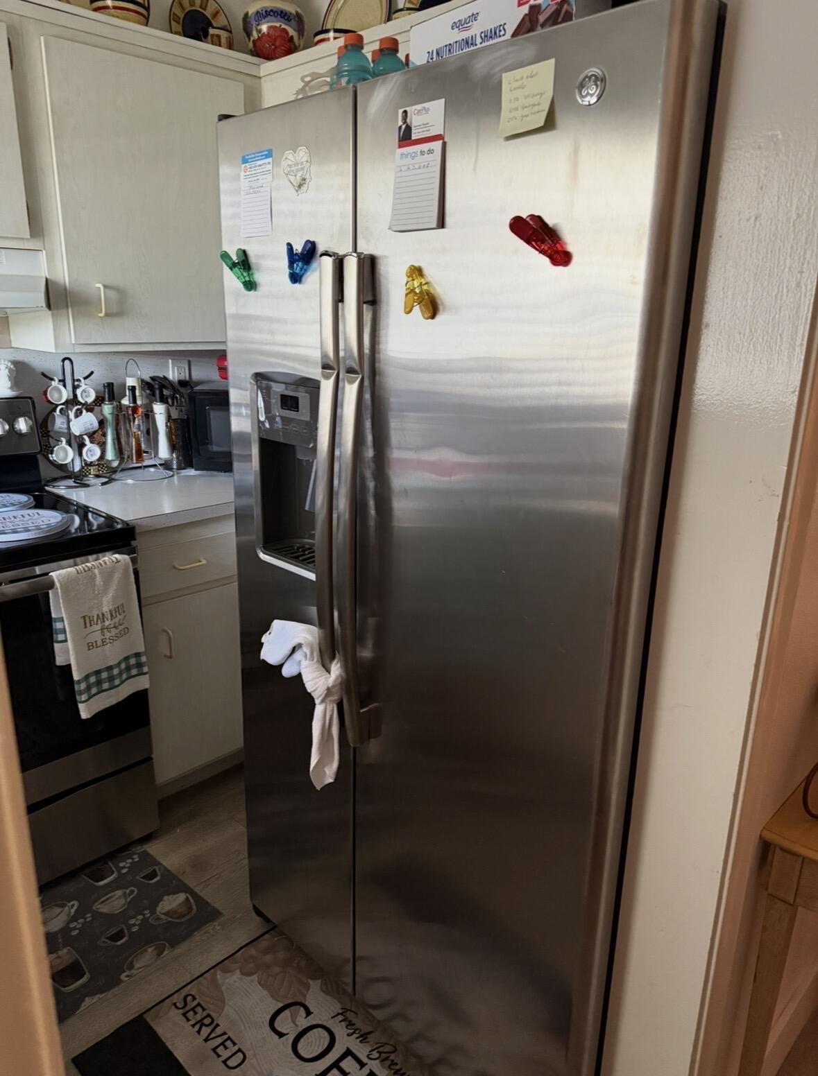 331 Southwest 8th Street, Unit 2CE Boca Raton, FL 33432 - Photo 6 of 19 a utility room with dryer and washer