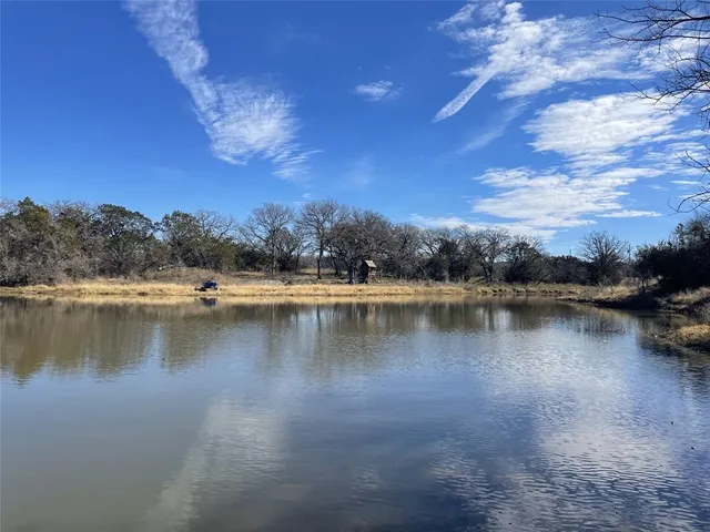 a view of a lake with outdoor space