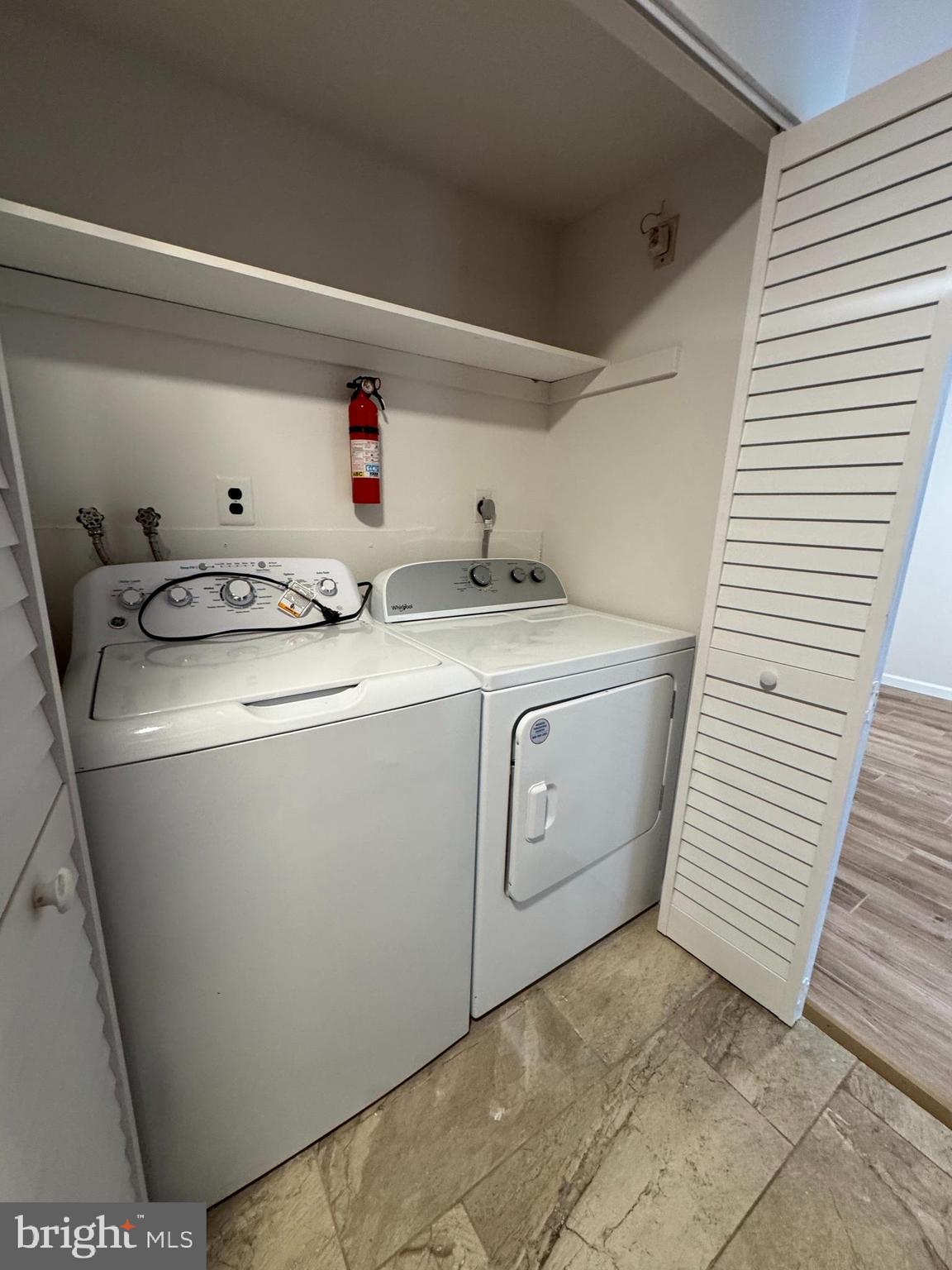 1023 Oakwood Drive, Unit 1 Huntingdon Valley, PA 19006 - Photo 4 of 6 a utility room with dryer and washer