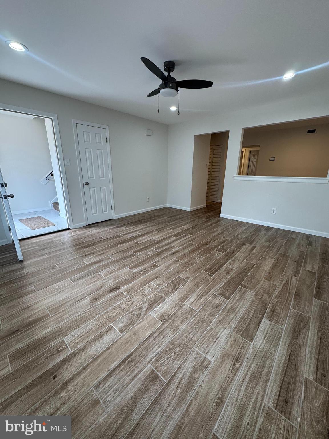1023 Oakwood Drive, Unit 1 Huntingdon Valley, PA 19006 - Photo 5 of 6 a view of an empty room and wooden floor