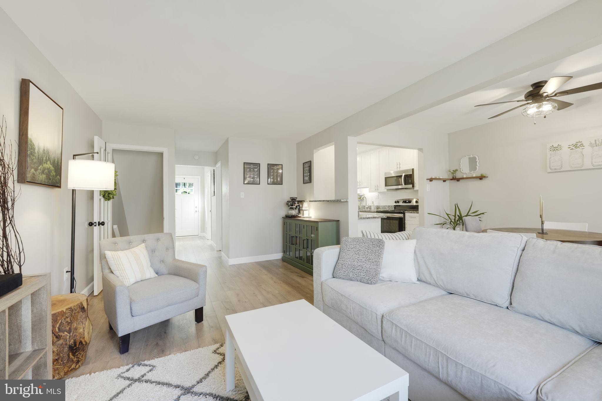 2310 Horseferry Court Reston, VA 20191 - Photo 16 of 49 a view of a living room kitchen and a couch