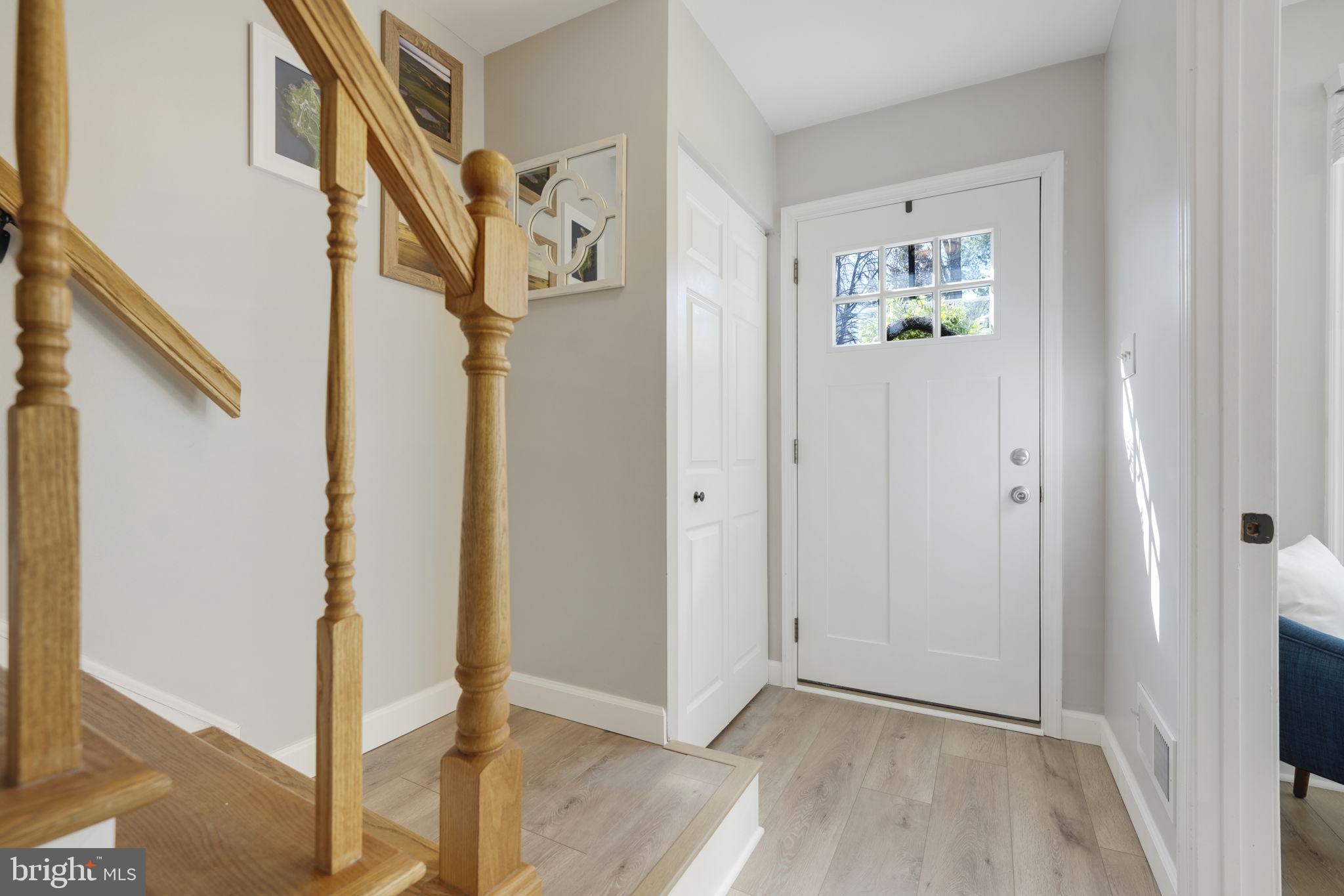 2310 Horseferry Court Reston, VA 20191 - Photo 20 of 49 a view of an entryway with wooden floor
