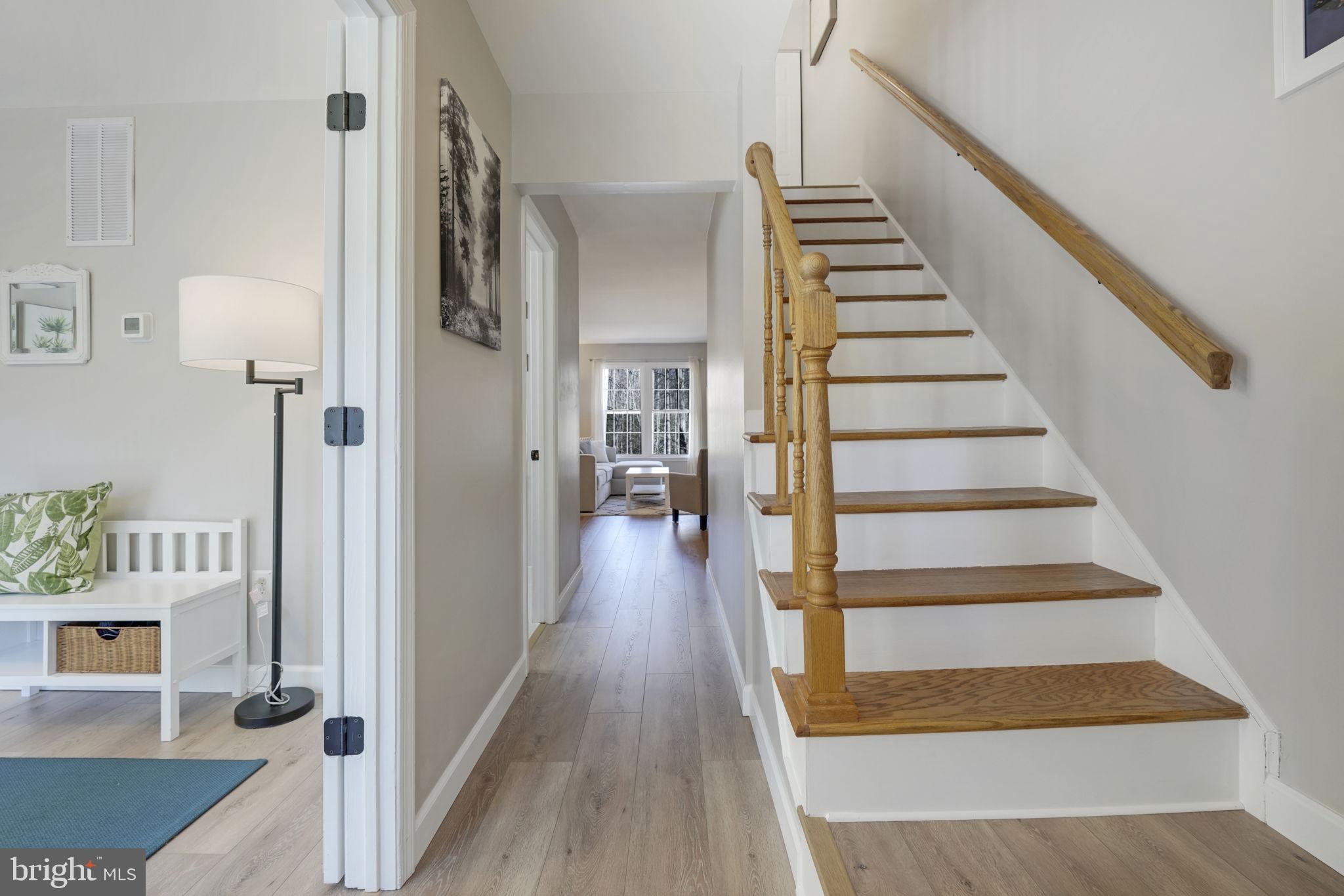 2310 Horseferry Court Reston, VA 20191 - Photo 2 of 49 a view of entryway and hall with wooden floor