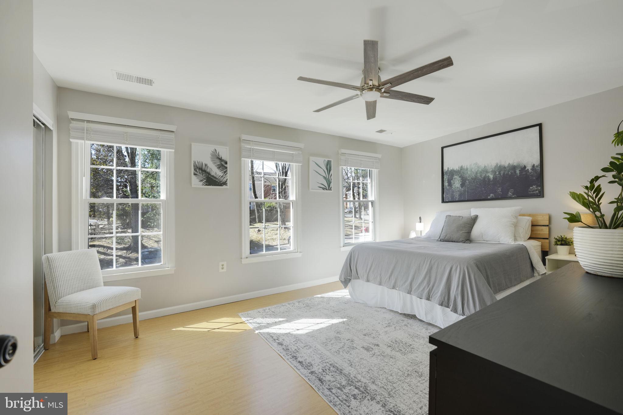 2310 Horseferry Court Reston, VA 20191 - Photo 23 of 49 a bedroom with a large bed and a window