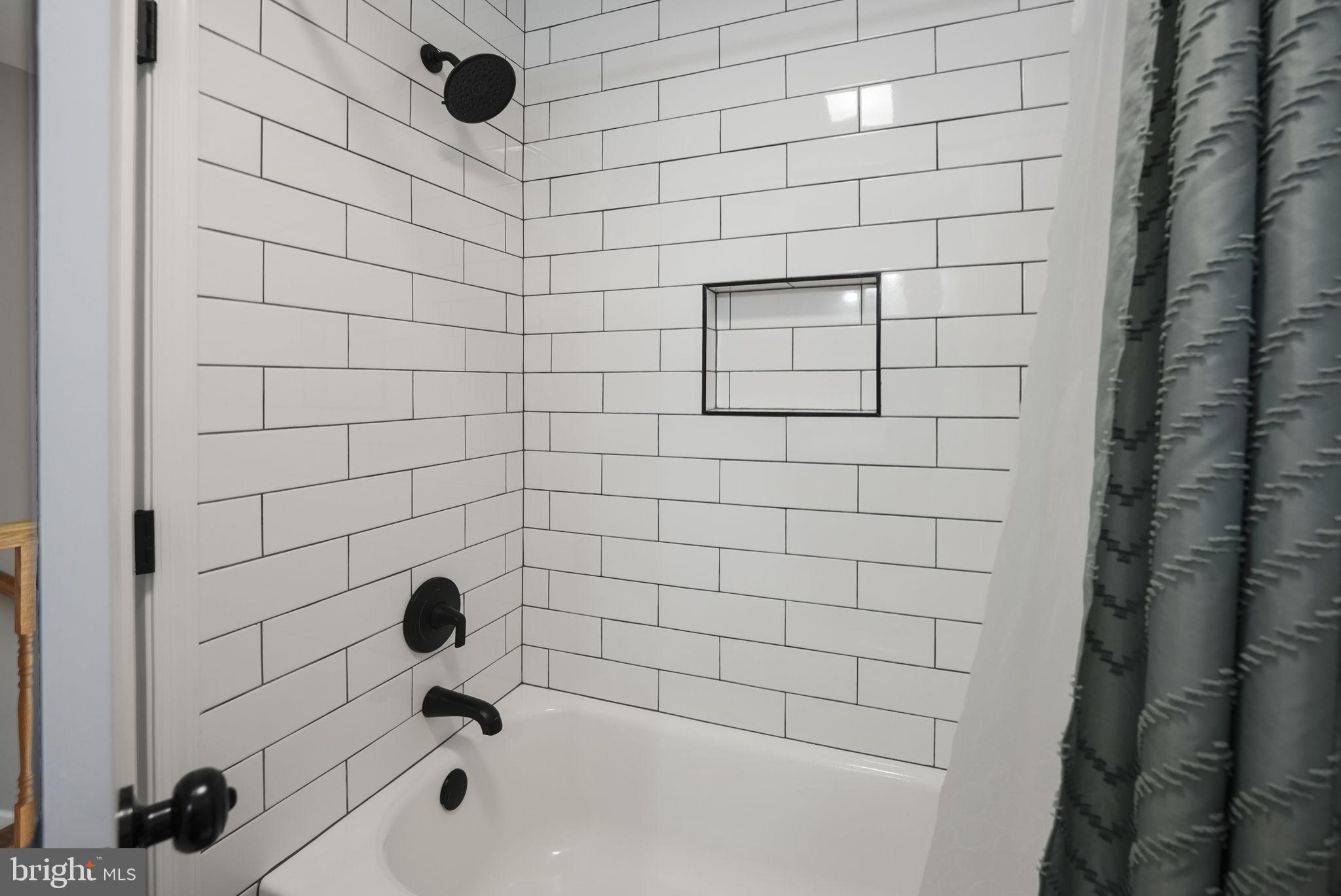 2310 Horseferry Court Reston, VA 20191 - Photo 31 of 49 a bathroom with a bathtub and shower