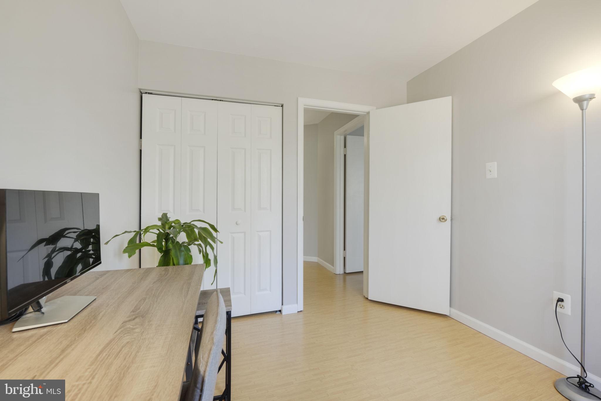 2310 Horseferry Court Reston, VA 20191 - Photo 33 of 49 a bedroom with a bed and a dresser