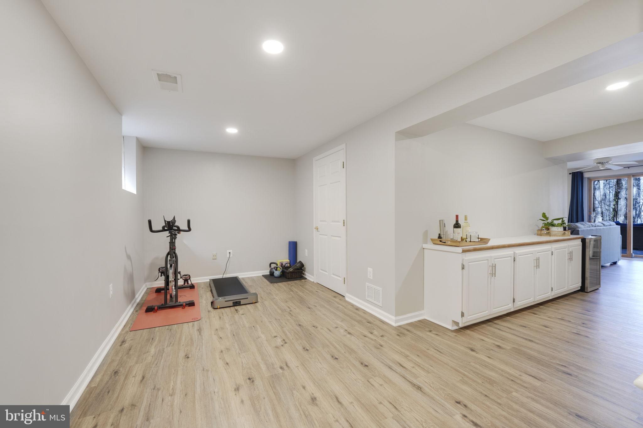 2310 Horseferry Court Reston, VA 20191 - Photo 35 of 49 a view of a kitchen with wooden floor