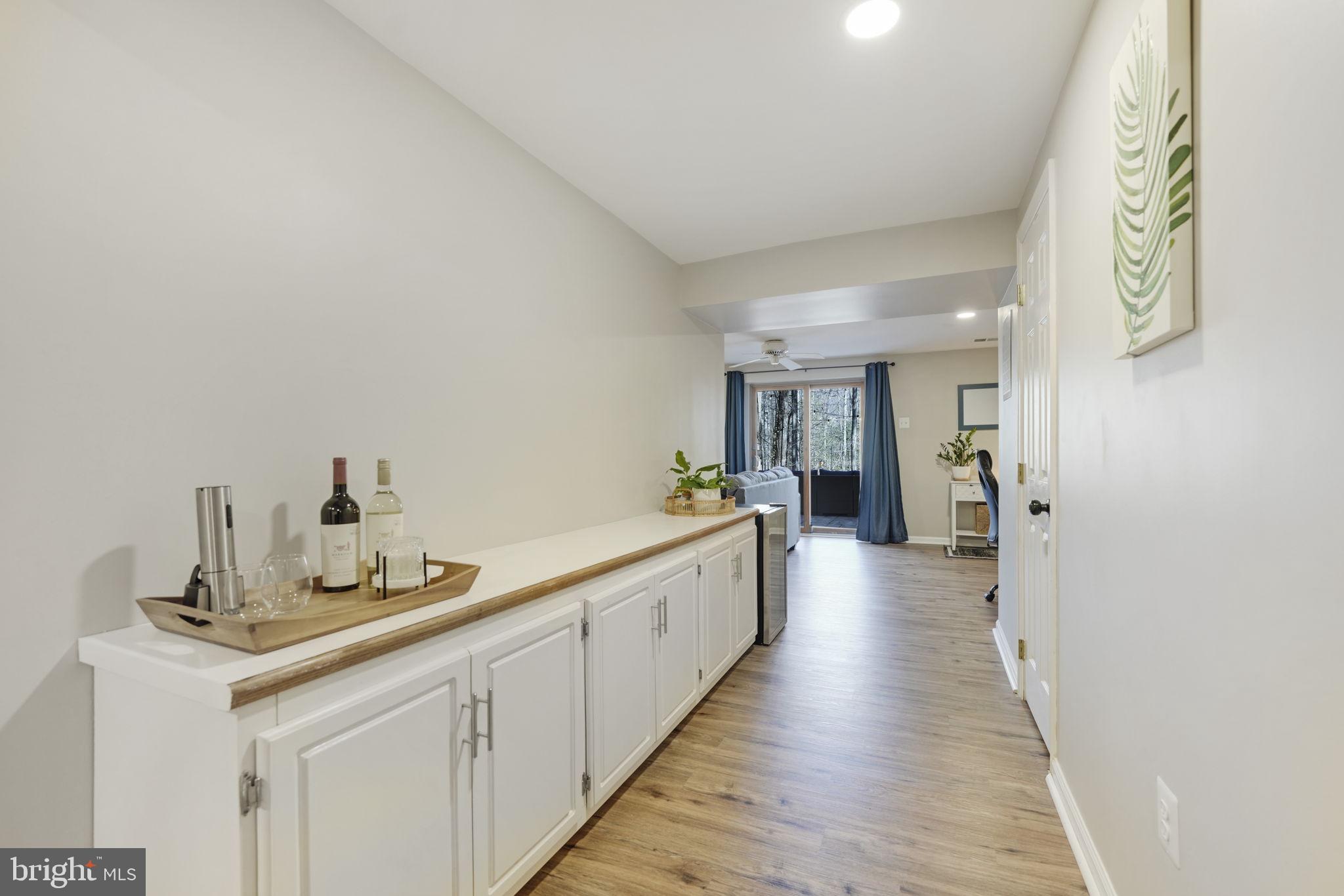 2310 Horseferry Court Reston, VA 20191 - Photo 36 of 49 a bathroom with a sink and a large mirror
