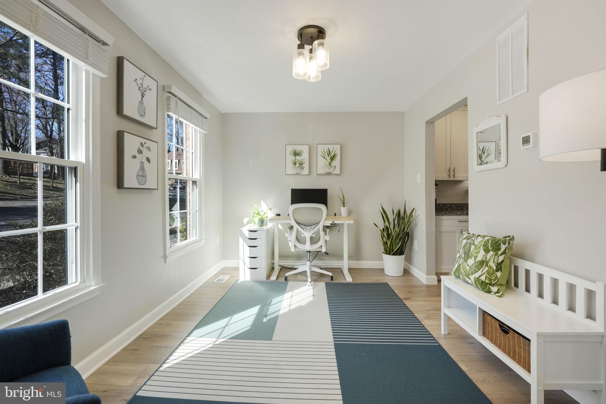 2310 Horseferry Court Reston, VA 20191 - Photo 4 of 49 a living room with furniture and a fireplace