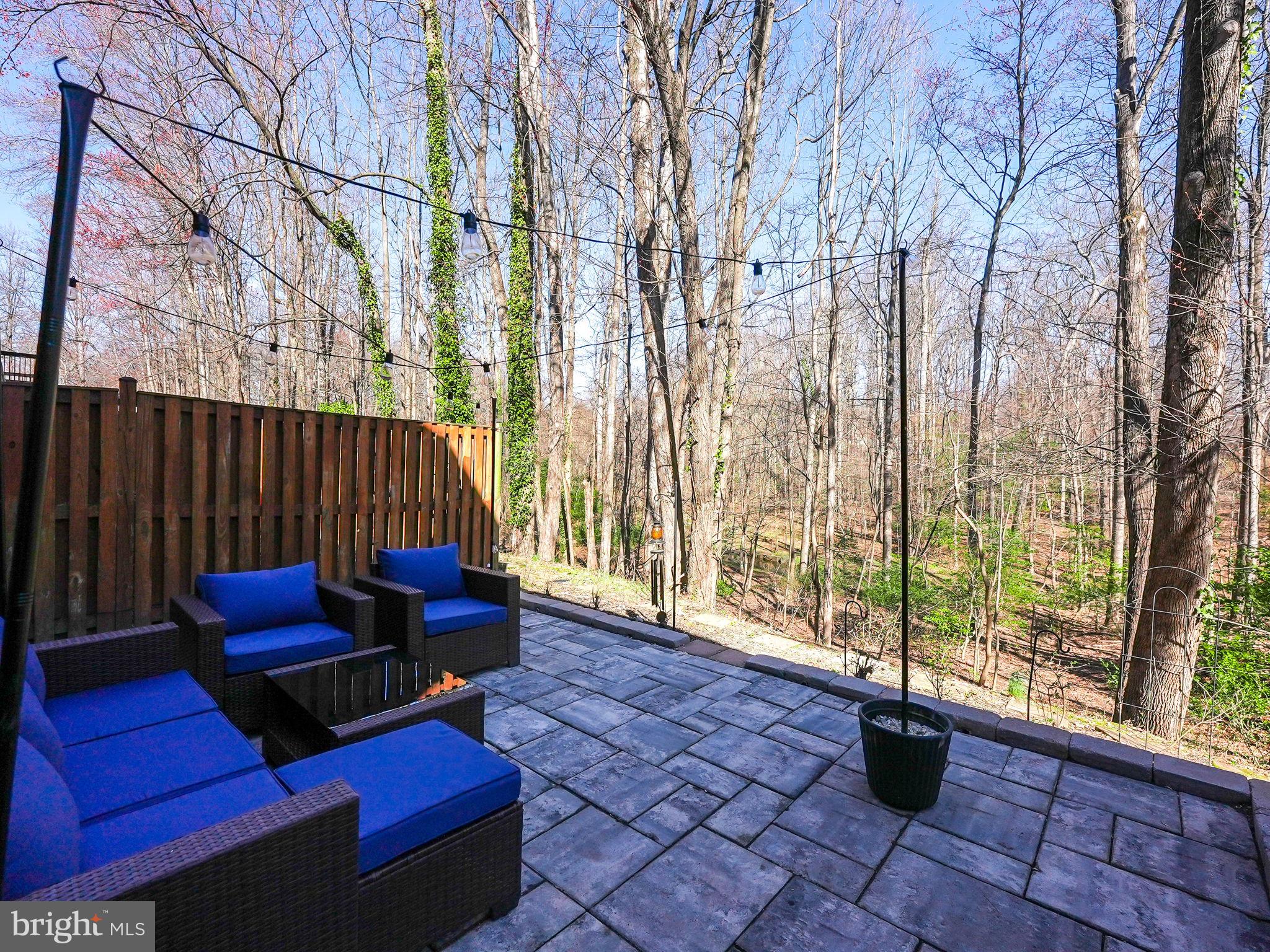 2310 Horseferry Court Reston, VA 20191 - Photo 44 of 49 a blue bench sitting in front of a building