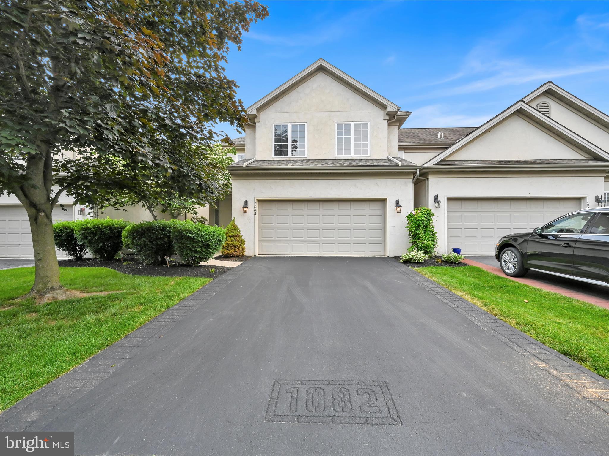 1082 Stillwood Circle Lititz, PA 17543 - Photo 1 of 44 a front view of a house with a yard and garage
