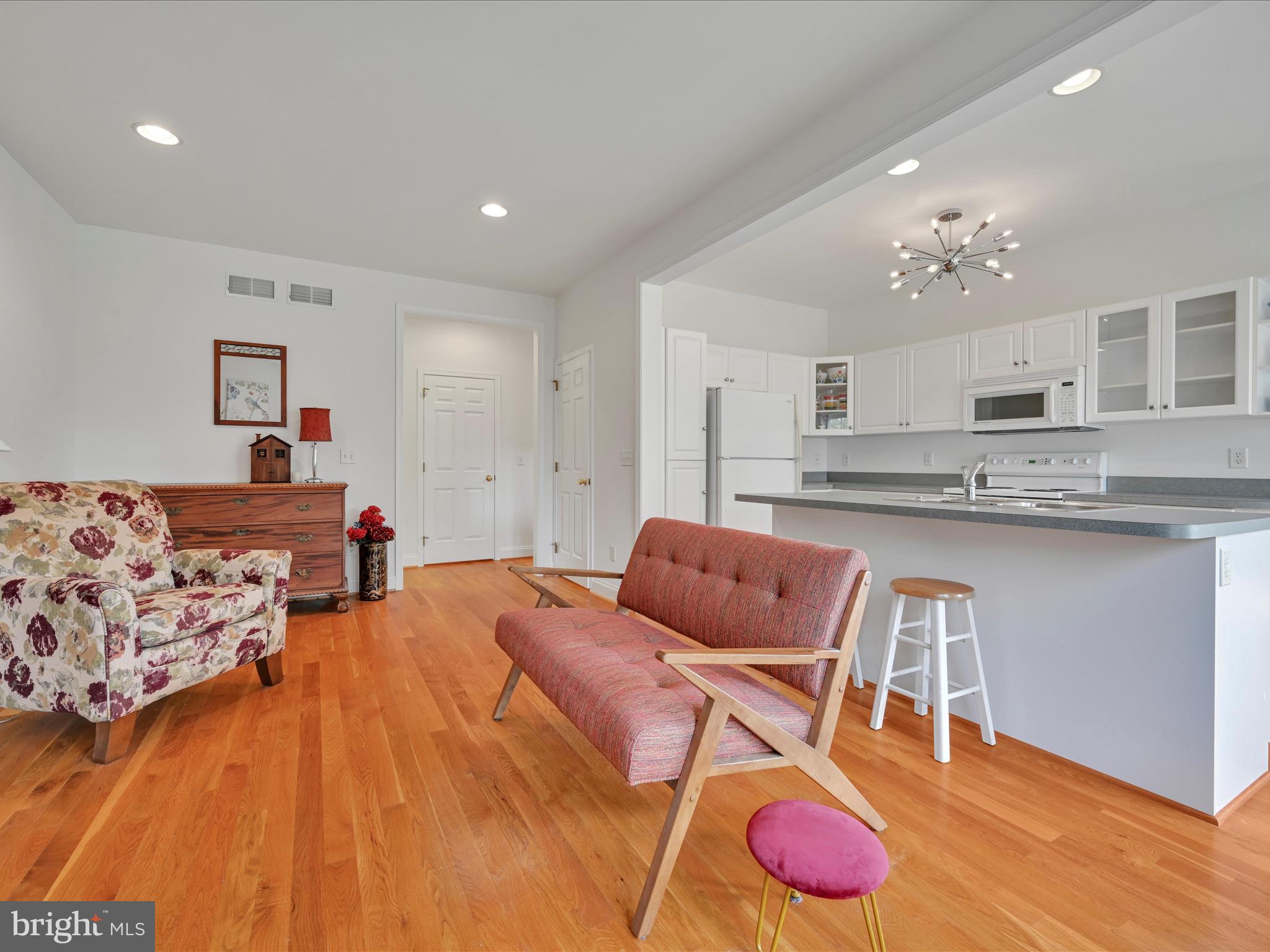 1082 Stillwood Circle Lititz, PA 17543 - Photo 16 of 44 a living room with furniture and kitchen view
