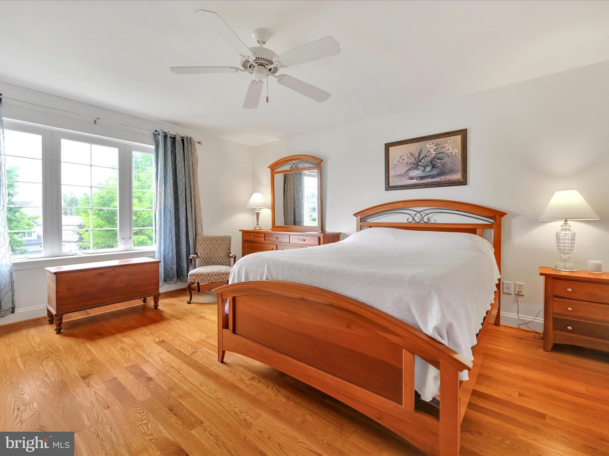 1082 Stillwood Circle Lititz, PA 17543 - Photo 19 of 44 a bedroom with a bed and a chandelier