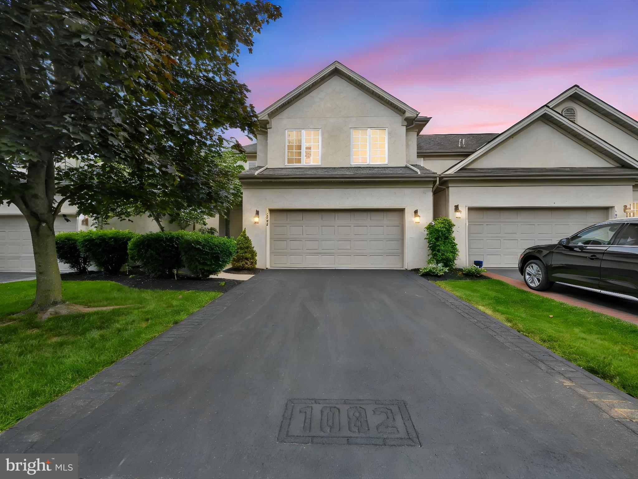 1082 Stillwood Circle Lititz, PA 17543 - Photo 2 of 44 a front view of a house with a yard and garage