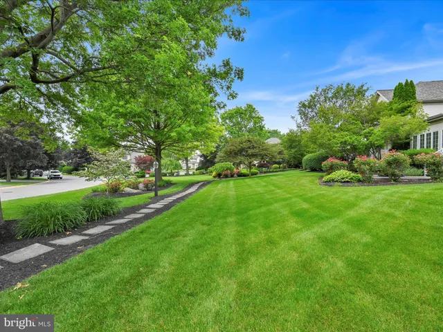 a view of a garden with houses