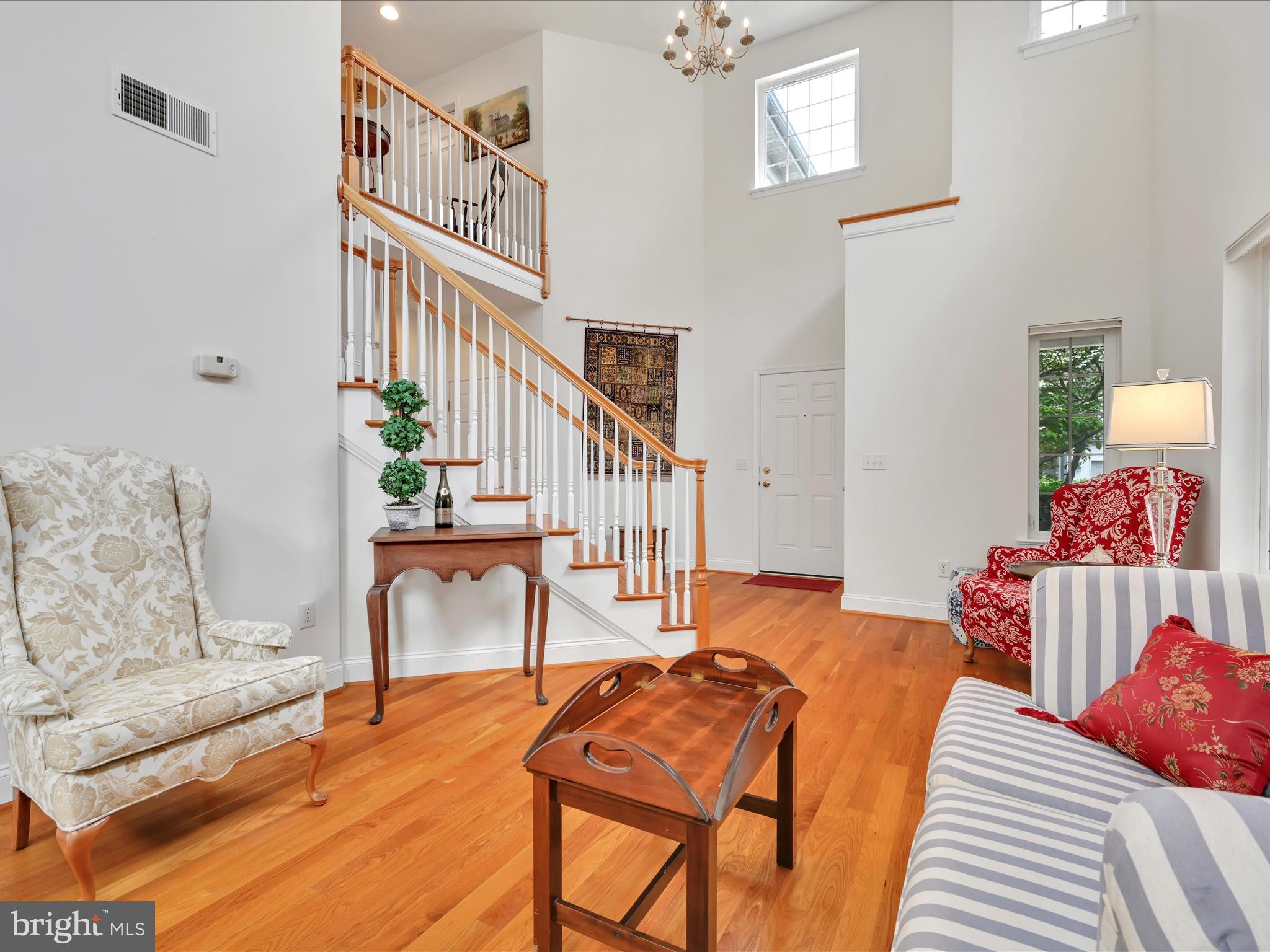 1082 Stillwood Circle Lititz, PA 17543 - Photo 8 of 44 a living room with furniture and a wooden floor
