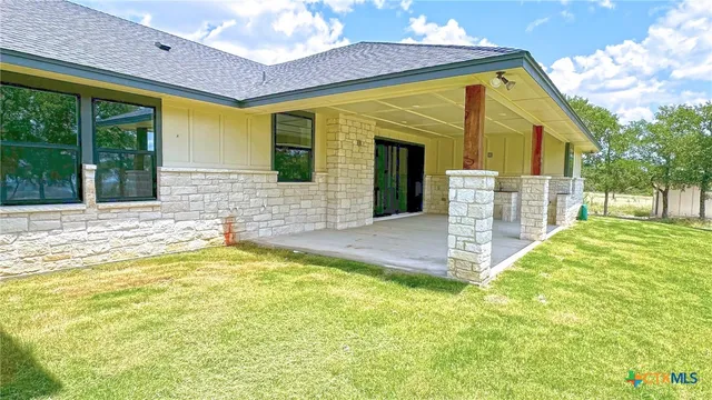 a view of house with garden