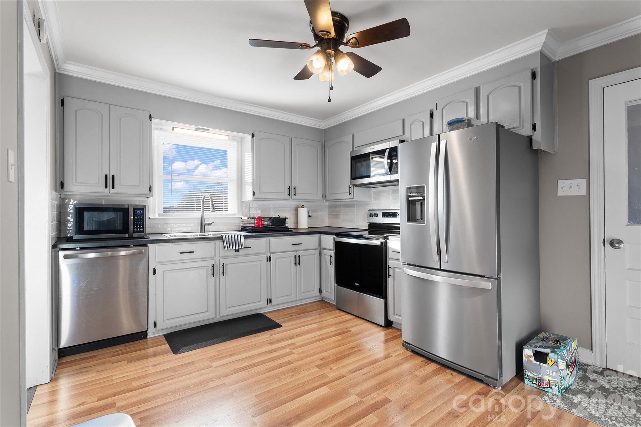 871 Saluda Road Chester, SC 29706 - Photo 2 of 46 a kitchen with stainless steel appliances a refrigerator sink and microwave